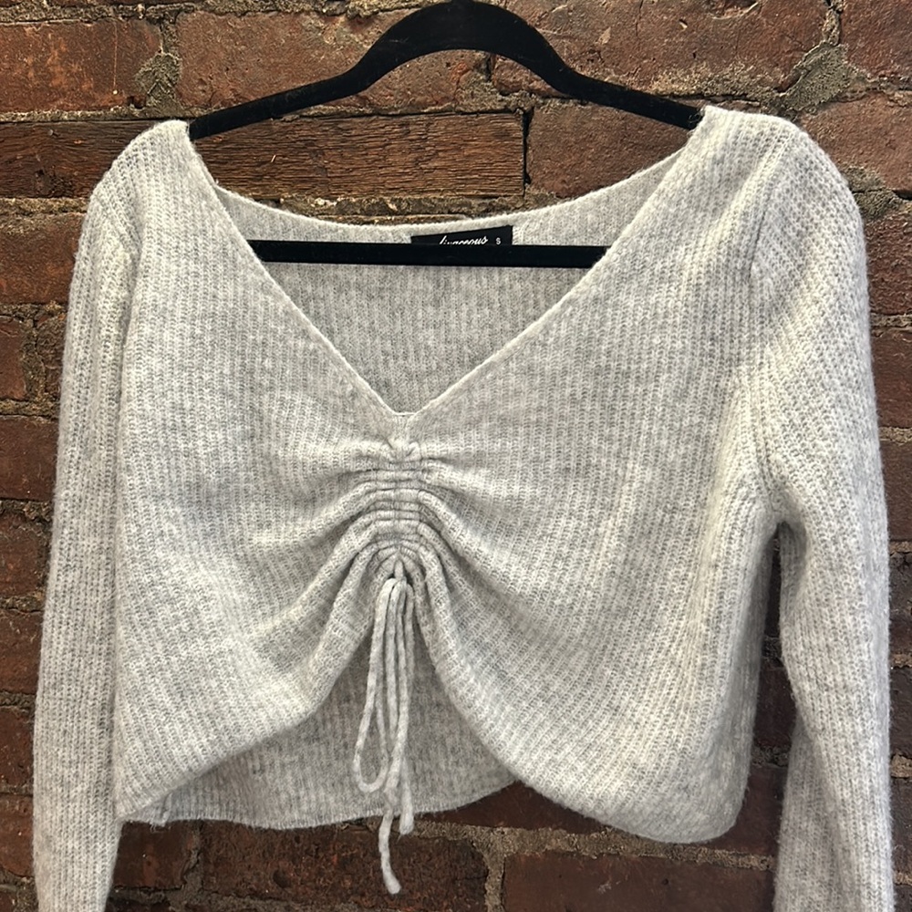 Cropped soft sweater with adjustable drawstring